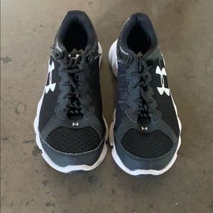 Black Under Armour youth sneakers.
